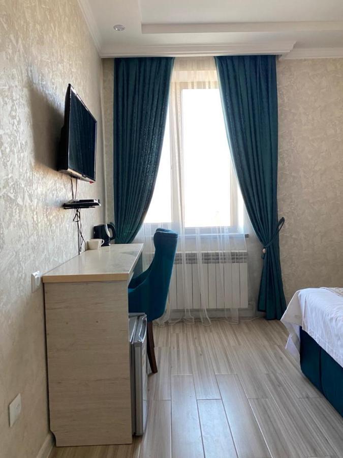 Comfort Hotel Turkistan Buitenkant foto